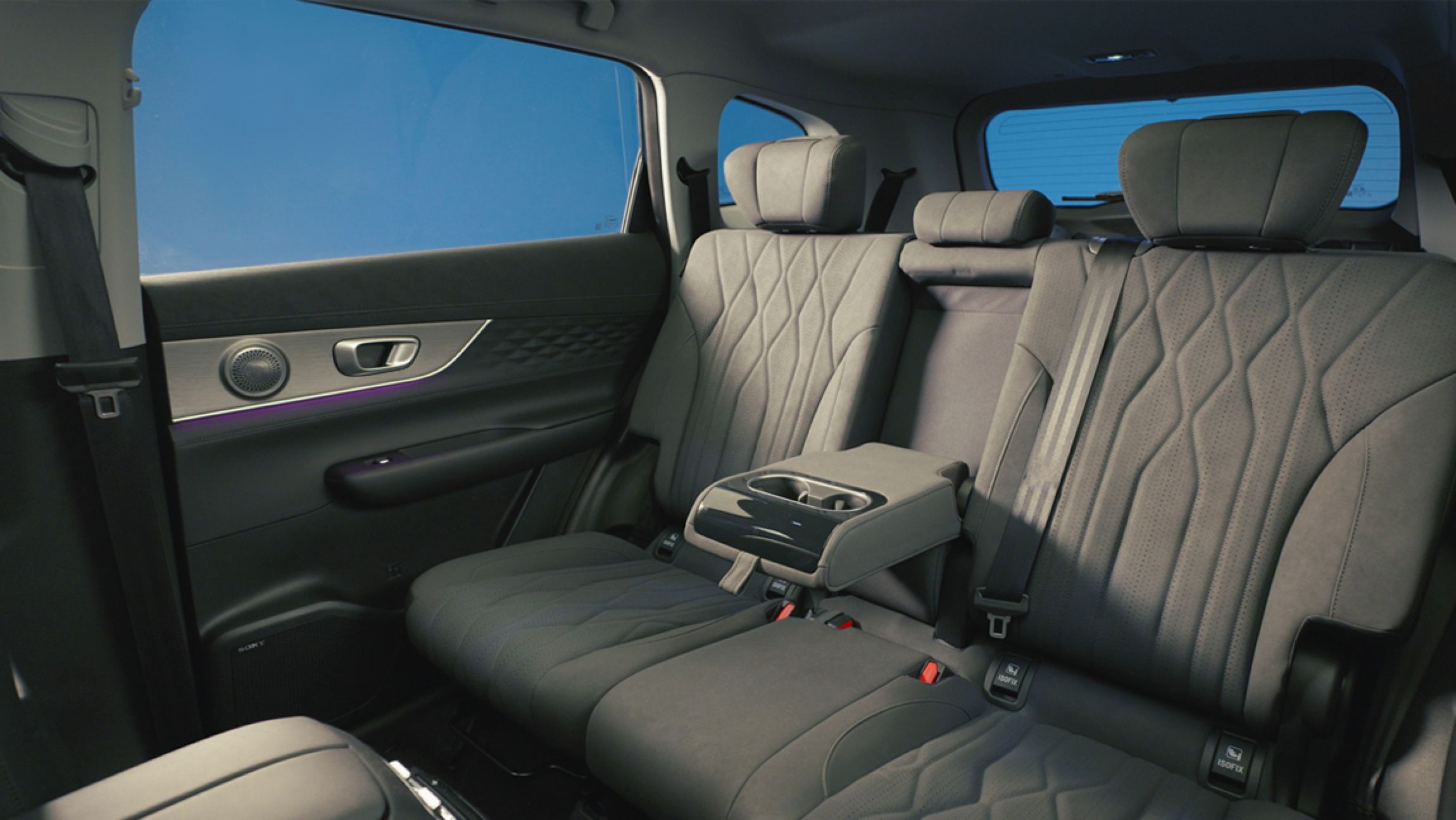 Chery Tiggo 8 SUV interior showing rear passenger seats in black leather with diamond-pattern stitching